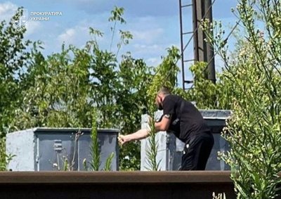 Підпал військового авто і диверсія на залізниці: столичний суд призначив трьом чоловікам по 15 років за ґратами