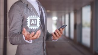 Бізнесмен тримає смартфон з концепцією ШІ-технологій у сучасному офісі